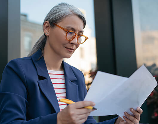 Woman checking papers